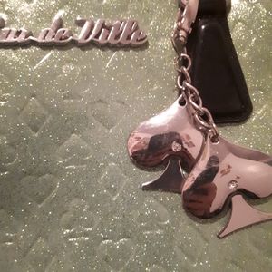 Lux de Ville Black Jack Bowler bag in baby green sparkle, embossed card suits